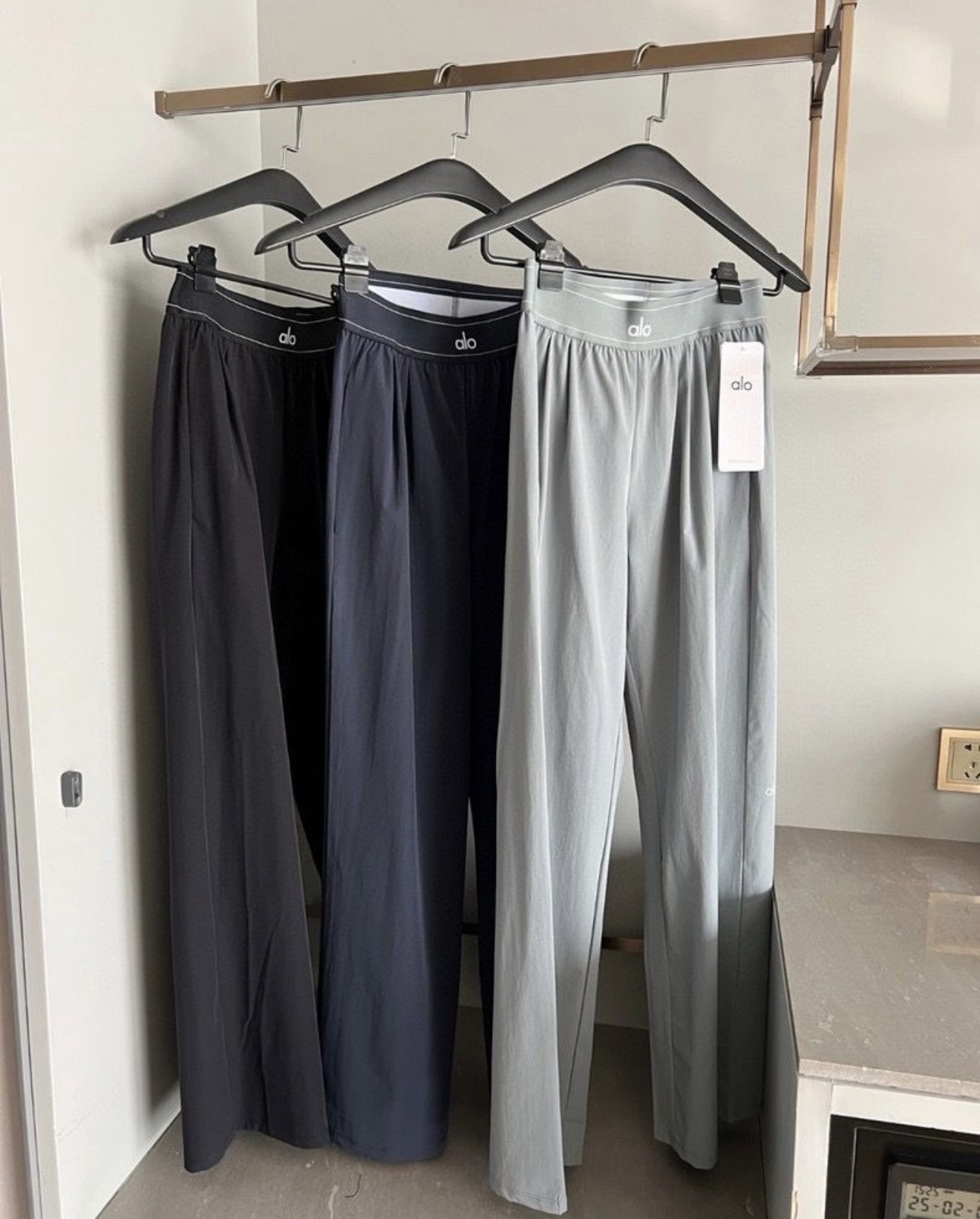 Grey trousers in stock